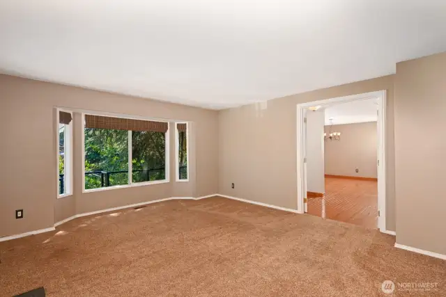 Living room looking toward the spacious dining room.