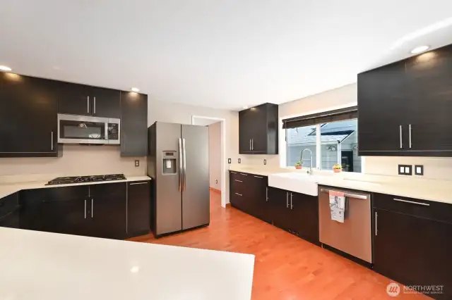 Farm house sink, sunlit all day, countertops and plenty of outlets for espresso coffee makers and other appliances.