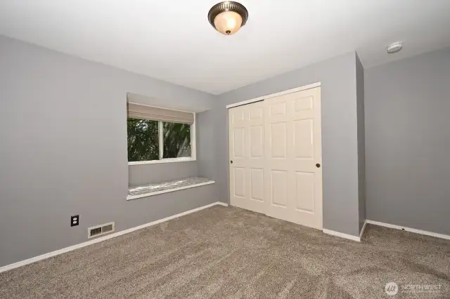 Bedroom #2 with window seat.