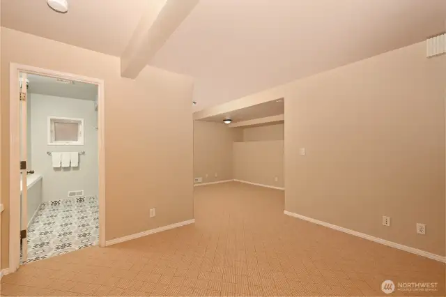 A three-quarter updated bathroom is perfect for this living space.
