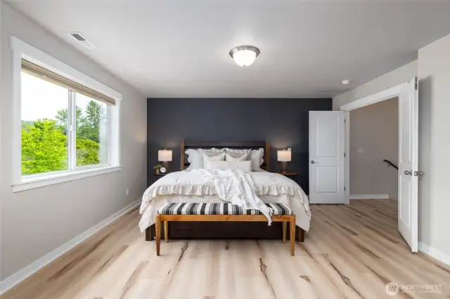 Light filled primary suite also has darkening shades for night time or naptime