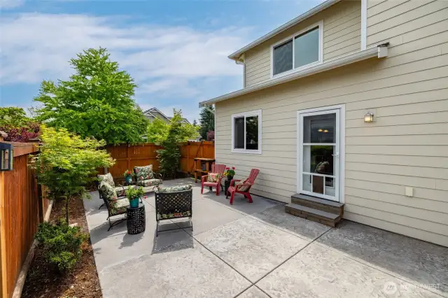 Lovely back patio in the low maintenance backyard