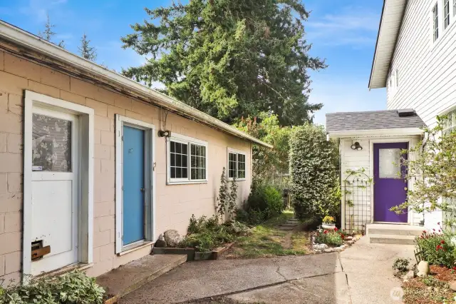 Back door to house on right, garage door on left and ADU door(blue)