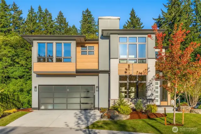 Extensive use of clear cedar siding and stone accents create a timeless NW Contemporary design