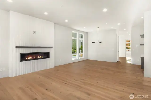 60" contemporary linear fireplace with full height tile surround and custom steel mantel