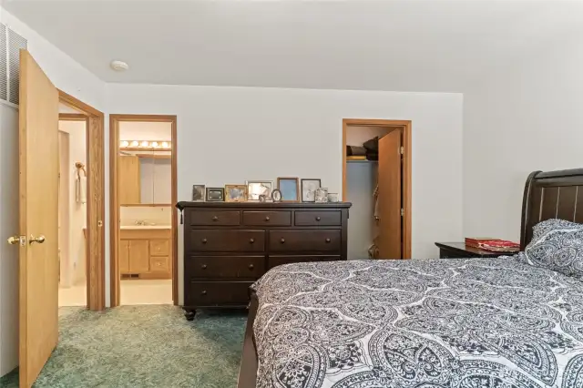 Primary Bedroom with Walk In Closet and Bathroom