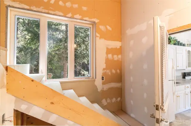 Laundry hookup and stairs to huge loft