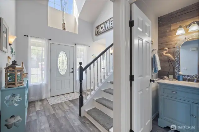 Beautiful natural light pours in from this airy foyer.
