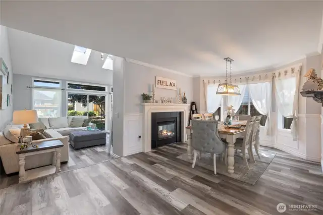 The double sided fireplace offers ambiance in multiple spaces!