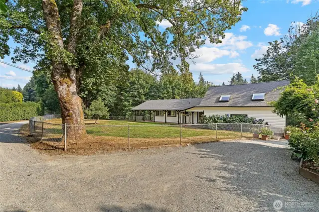 Fully fenced in front yard.