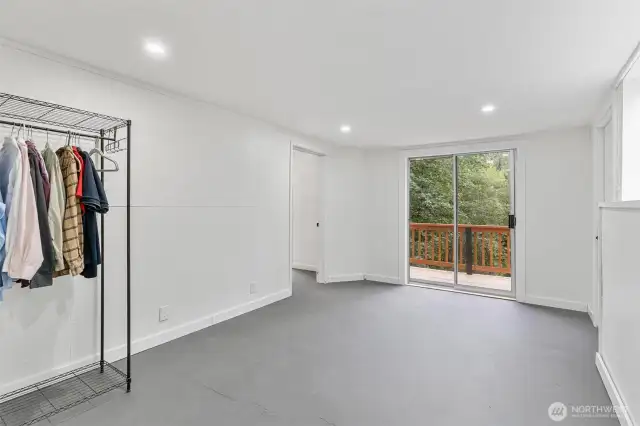 Bedroom #3 with private deck overlooking Woods creek.
