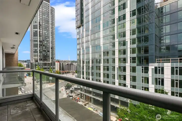Private deck off living room with city views