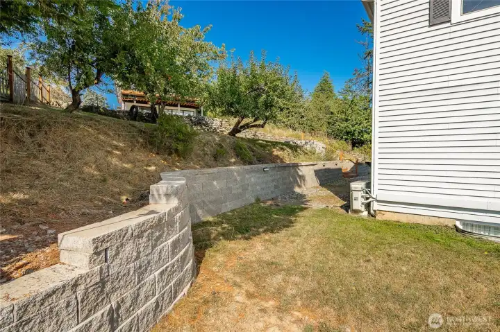 New retaining walls and leveling the landscape.