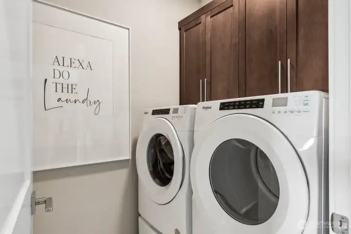 Upstairs laundry room with washer dryer w/pedestals