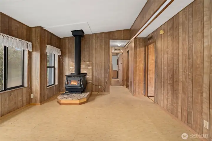 Main Living area  off the kitchen with wood -burning stove
