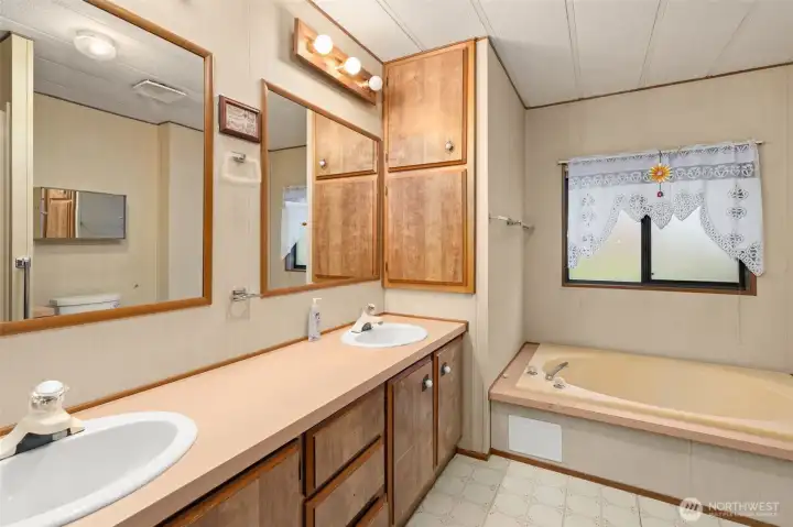 Primary Bedroom featuring private full Bathroom