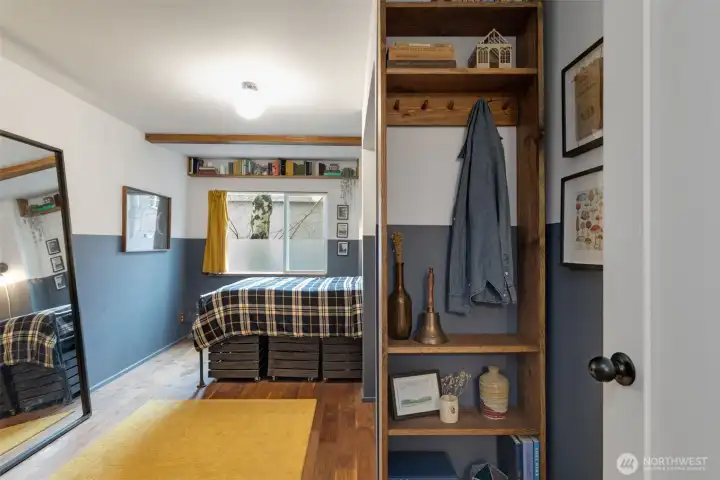 Entry into the room has custom cabinetry, all in walnut.