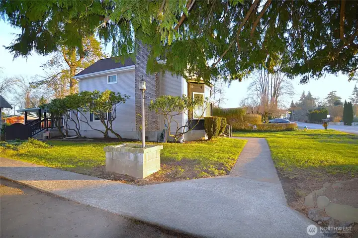 Detached garage w/ shop + barn for livestock or storage.