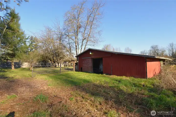 Flat usable riverfront acreage w/ classic character.