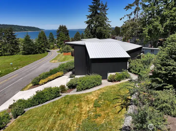 Aside from a great location this home is eye catching with modern lines. Aside from a great location this home is eye catching with modern lines.