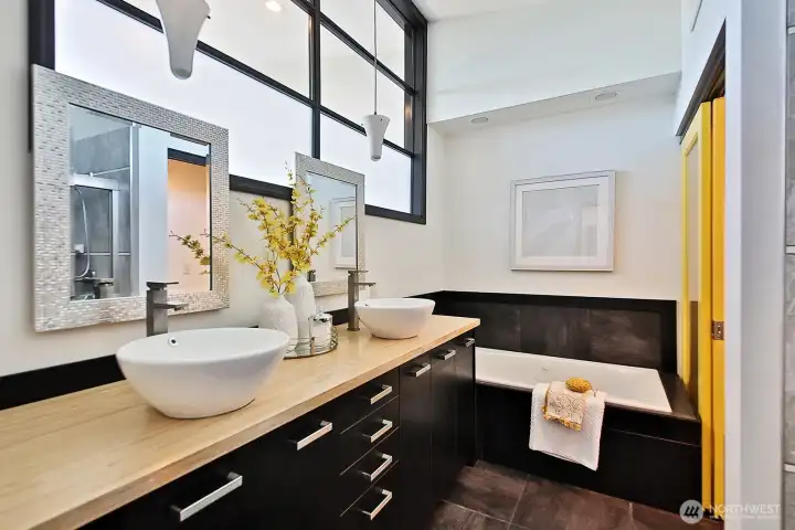 Primary bath is a full bath with double sinks. Primary bath is a full bath with double sinks.