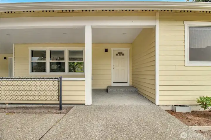 covered front entry with patio