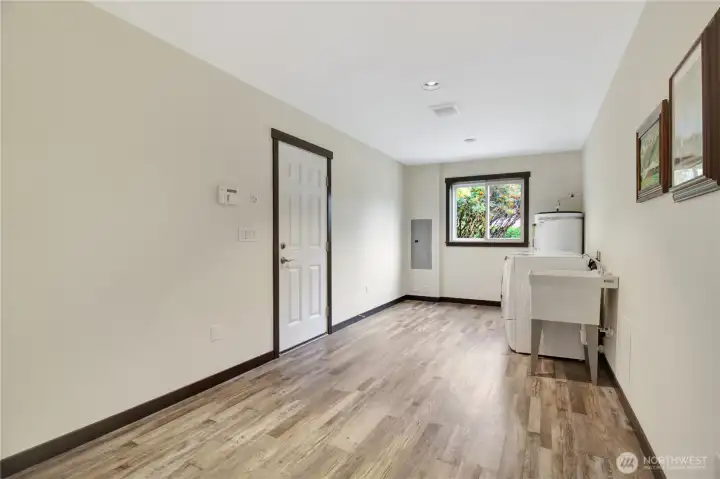 Storage with outdoor exit and utility room space!