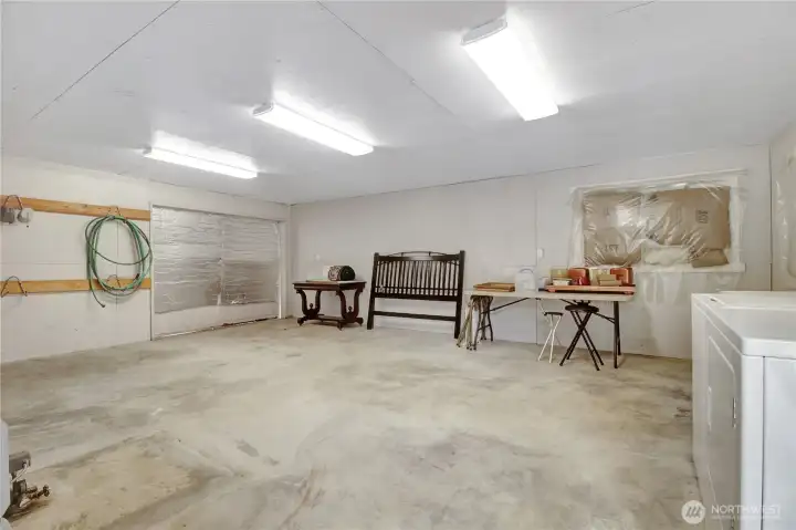 water system, washer and dryer and space for your toys!