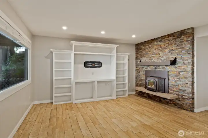 Lower level living room with wood burning stove.