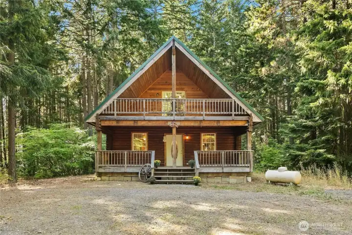 Just what you have been looking for!  Darling cabin in the woods, plenty of elbow room around you (almost 15 acres!) fresh pine air and no traffic driving by your front door. This home and land have SO many opportunies awaiting you. Build a super cool shop/garage, bring your horses (if you have them) ride right out the back gate to Palouse to Cascades Trail (goes all the way to Idaho!) Upper and lower covered front decks, take your pick and watch as the morning sun arises to the east