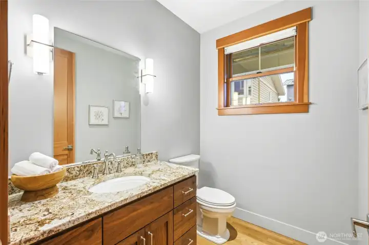 Powder room off the hall.