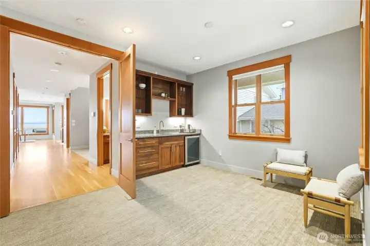 French doors open to this well appointed family room. Room for a variety of seating for whatever is happening!