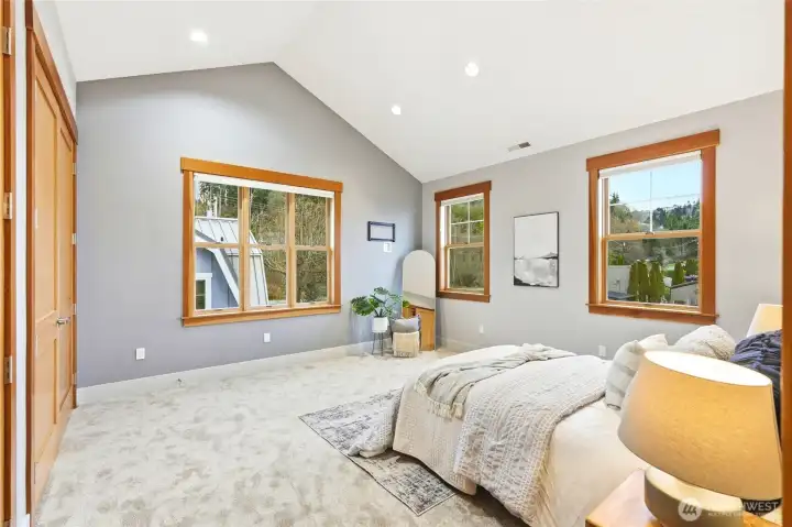 Third bedroom on the 2nd floor. Two closets and ample windows.