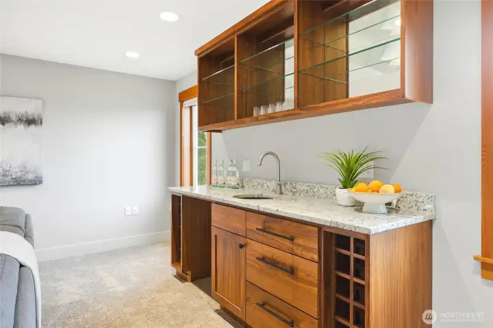 Another wet bar and plenty of area to expand the options. Another wet bar and plenty of area to expand the options.