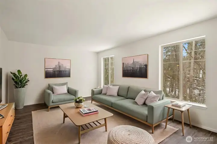 The Living room is bright and full of natural light with outdoor feel right outside your windows!