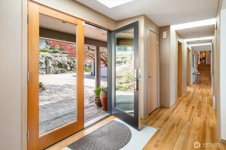 Wood clad doors and original hardwood floors give this home an upulent feel.