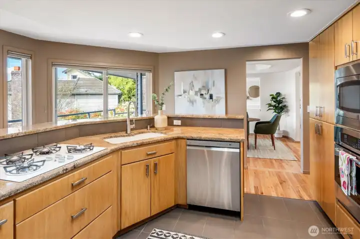 The layout continues to a Chef's kitchen with a gas cooking top.
