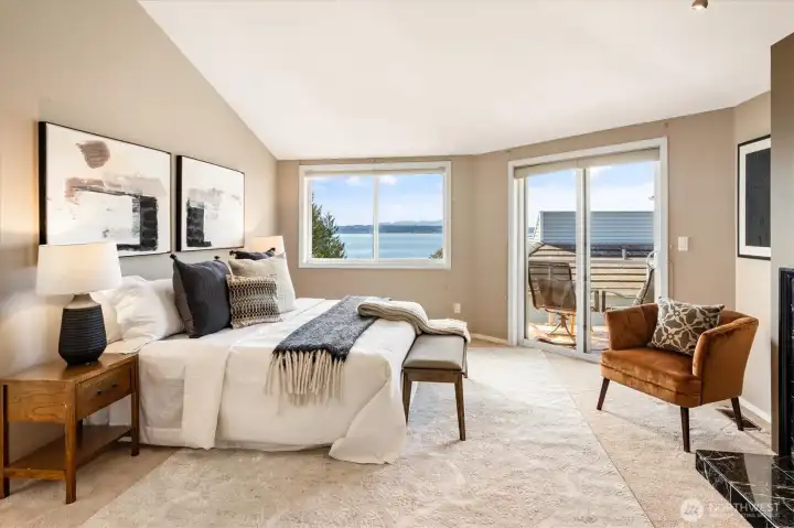 Upstairs is the primary bedroom with vaulted ceilings, 5 pcs bath & walk-in closet.