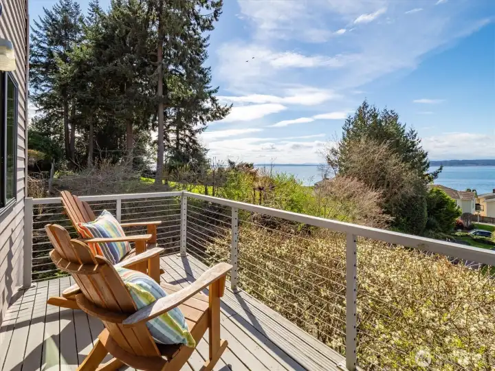 Private deck off the primary with more sweeping views of The Sound and mountains.