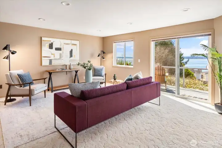 Downstairs is a large family room with another view deck.