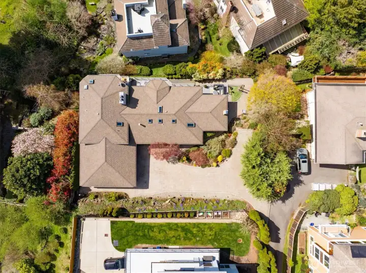 Don't miss the convenient parking pad on the north of the driveway.