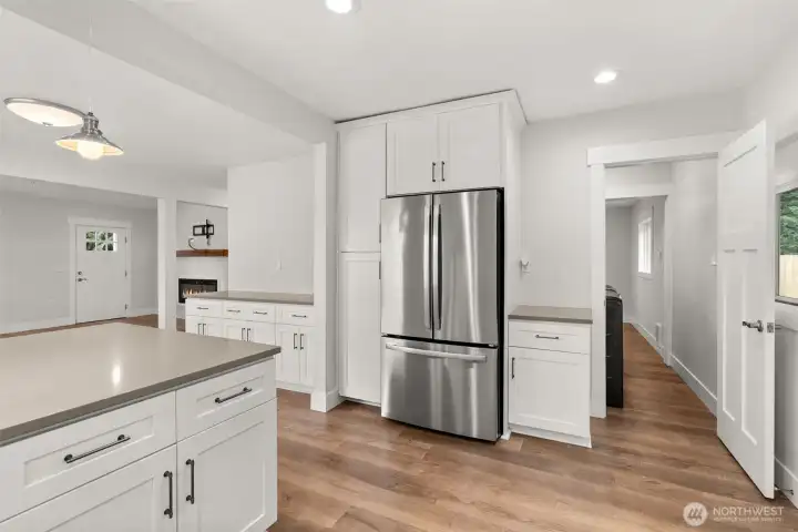 Kitchen has an abundance of storage.