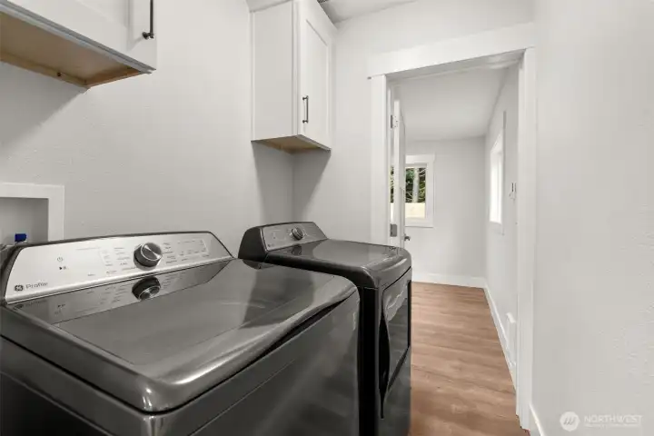 Laundry room with washer and dryer!