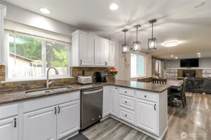 Updated kitchen with slab granite counters Updated kitchen with slab granite counters