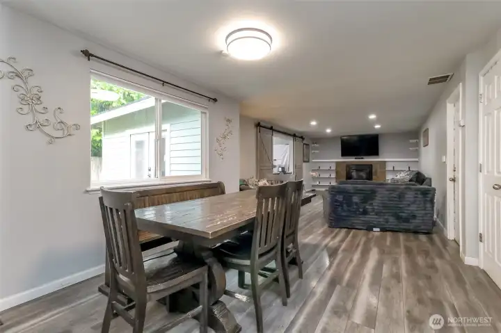 The great room accomodates kitchen counter eating space, dining room space and of the far end your hang out area with wood burning fireplace and double wide door entry into the living room! The great room accomodates kitchen counter eating space, dining room space and of the far end your hang out area with wood burning fireplace and double wide door entry into the living room!