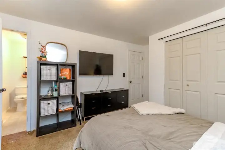 This is another view of the second primary bedroom upstairs with the private .75 bathroom This is another view of the second primary bedroom upstairs with the private .75 bathroom