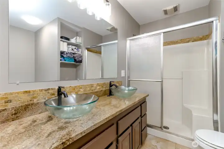 This is the main floor primary bedroom bathroom This is the main floor primary bedroom bathroom