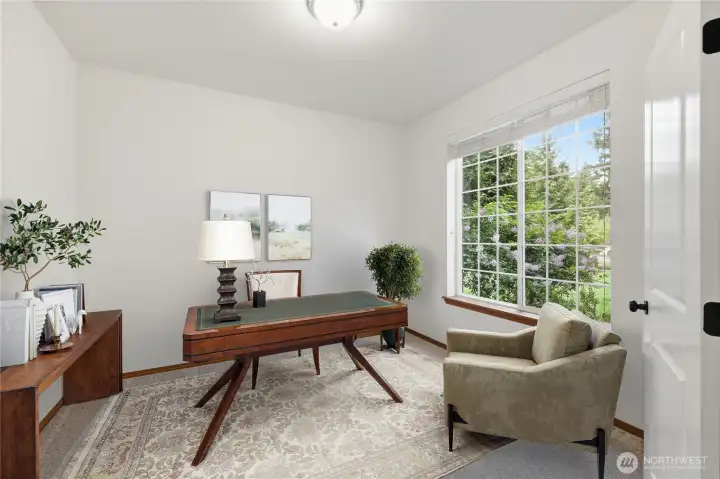 Virtually Staged 1st room off from the entrance. Can be used as an office, music room, or a library. What are your needs?