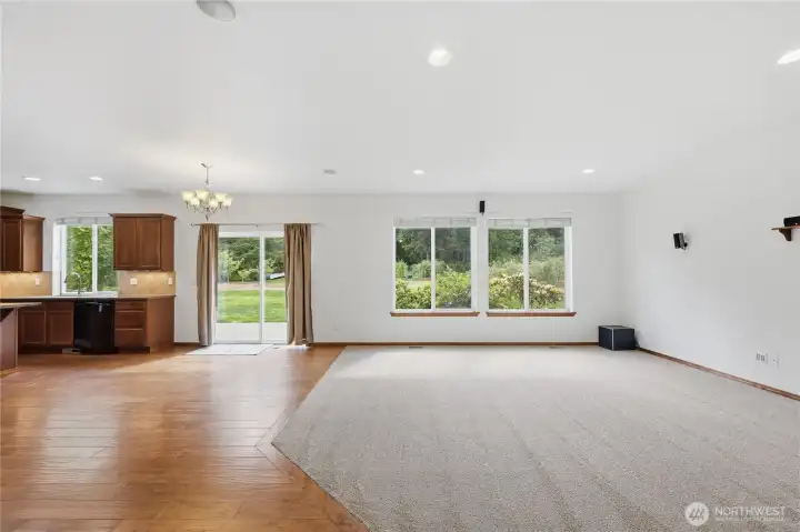 Unstaged living and dining area.