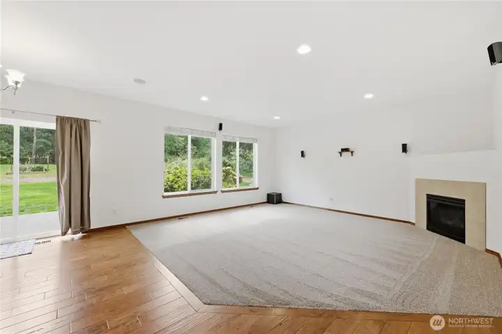 Unstaged living and dining area.